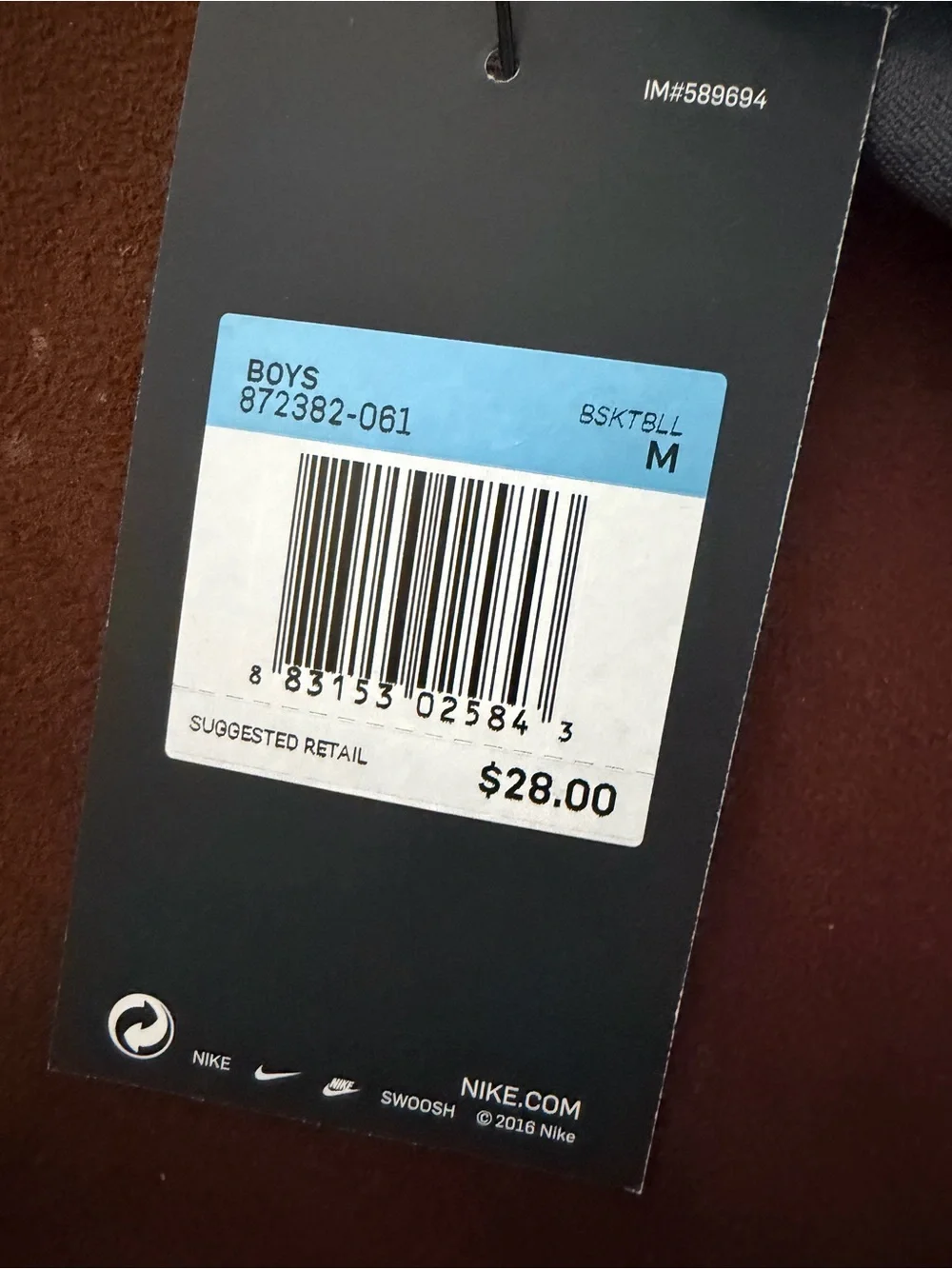 Nike Black Retail Hang Tag with Blue Price Sticker